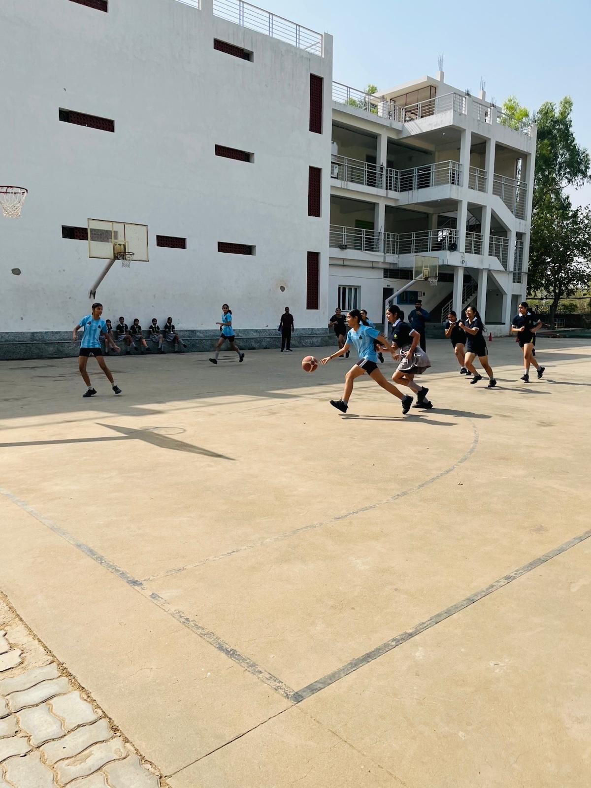 Students participating in basketball